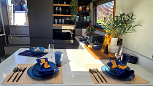The boat features a fully equipped kitchen with open plan living space...