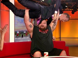 Supporting image for story: WATCH: Staffordshire strong man Eddie Hall bench presses BBC presenter Dan Walker