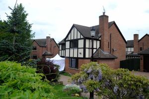 Police at the house in Millfield Drive, Market Drayton