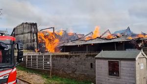 Two agricultural buildings were "well alight". Pic: Oswestry Fire Station