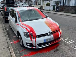 Supporting image for story: Volkswagen Golf left drenched in red paint after it was left parked in a disabled bay