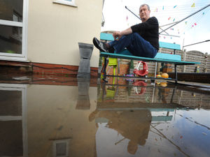 Supporting image for story: Family home surrounded by sewage for two weeks due to blocked pipe