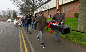 Walsall fans protest about the board at Banks's Stadium.