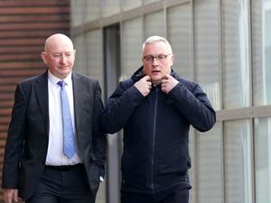 Pc Stephen Evans (right) leaving Empress State Buildings in London