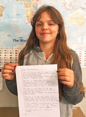 Sophie Edwards of Year 6 with a note to say thanks