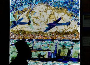 Director of Stourbridge Glass Museum Alexander Goodger views the section of the Churchill Memorial Screen on display at the museum. Photo: Tim Thursfield