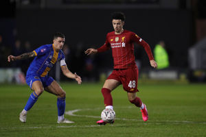 Curtis Jones of Liverpool and Oliver Norburn of Shrewsbury Town. (AMA)