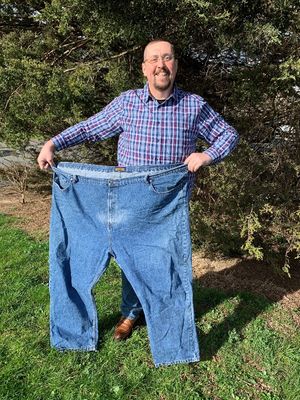Jason Parrish with a pair of his old jeans