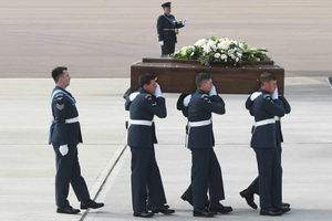 The coffin of Joel Richards is taken from the RAF plane