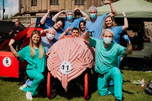 Matthew Woodward, sitting in the driver's seat, with his team of pals that together won Shrewsbury Wacky Races 2019