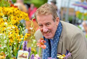 John Challis enjoys the flowers