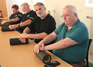 Applying pressure…attendees practice during the demonstration.  