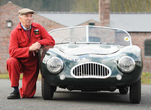 Keith Peckmore alongside the motor