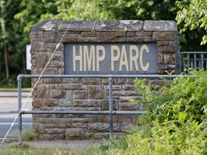 Sign for HMP Parc in Bridgend