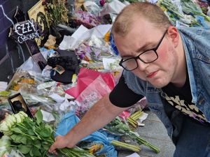 Supporting image for story: 'I felt I had to pay tribute' - Devoted Black Sabbath fans spent hours at memorial meet-up to pay respects Ozzy Osbourne