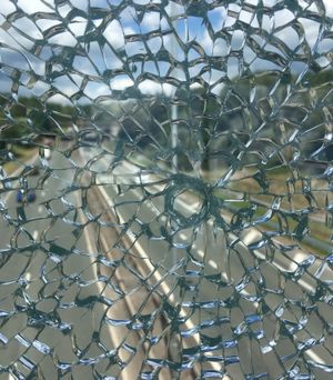 A focal point of the cracks in the panel