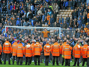 Supporting image for story: Arrest threat to pitch-invading Wolves fans