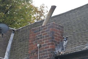 The Old Bush Pub in Swindon, near Himley. Hit by a car. Today Wulfrun Building Services were making safe the chimney by taking some of the height off of it. This is where the car hit. Nobody inside for comment.