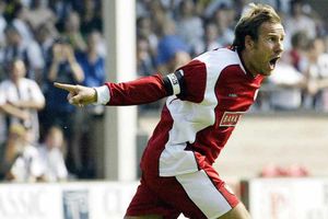 Walsall's Paul Merson celebrates scoring the opening goal against West Bromwich Albion during their Nationwide Division One game at Walsall's Bescot