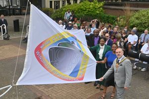 The Windrush flag is raised at Wolverhampton Civic Centre (R-L). Mayor: Craig Collinswood , Simone Stewart (guest speaker), Deputy Lord Lieutenant of the West Midlands Sandra Samuels OBE; Bishop Ruben King.