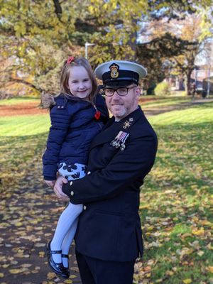 Tom Everson holding his daughter Georgia