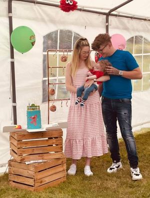 Ronnie and his parents during his first and only birthday