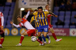 Ryan Bowman of Shrewsbury Town and Josh Scowen of Wycombe Wanderers (AMA)