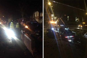 Emergency services check over the wreckage of the BMW before it is towed away. Pictures: Zowaib Rehman