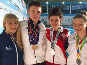 Supporting image for story: Swimming duo take aim at the Olympics