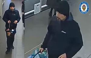 Police want to speak to this man following a robbery at a Birmingham shop. Photo: West Midlands Police 