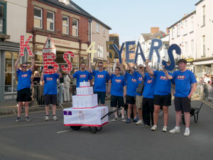 Kington Building Supplies employees with their 45th anniversary display. Andy Compton image