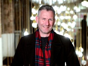 Supporting image for story: Comedian Adam Hills yet to believe MBE is not a prank