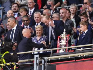 Supporting image for story: William and George present trophy to FA Cup winners Manchester United