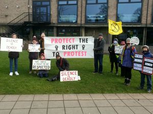 Supporting image for story: Silent protest outside council meeting 