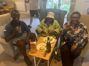Residents and family members at HC-One’s Perry Locks Care Home celebrating cheese and wine day