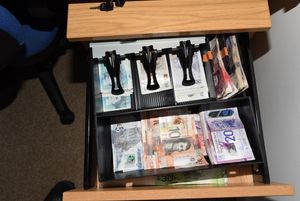 Cash was found hidden in a bed in Sutton Coldfield. Photo: National Crime Agency