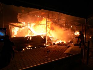 Supporting image for story: Israeli strike on hospital camp kills four, igniting fire that burns dozens