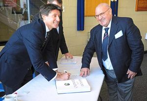 Mixing with the stars – Holmes shares a joke with one of Britain's great athletes, Sebastian Coe