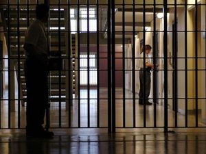Supporting image for story: Prison officer who was paid to smuggle mobile phone into jail is locked up