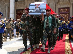 Supporting image for story: Yemenis mourn Houthi prime minister as rebel group targets ship in Red Sea