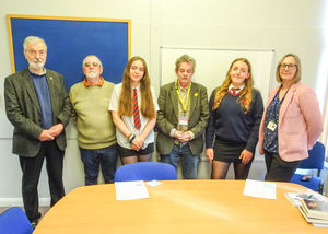 Photo (L-R) Rotarian Arthur Harries and Ciaran O’Connell, Isabelle Crowden, Rotarian and author John Dingley, Annabelle Ealey-Fitzgerald and Head of English, Anwen Nicholls