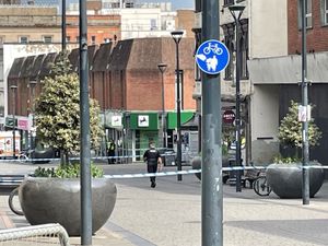 The scene in St Peter’s Street, Derby, as a murder inquiry continues into the fatal stabbing of a customer in a branch of Lloyds Bank
