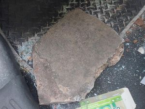 Supporting image for story: Passenger injured after concrete slab thrown onto Aston Expressway smashing car window