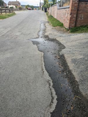 The water company dug up the road in the wrong place despite water seeping through the road