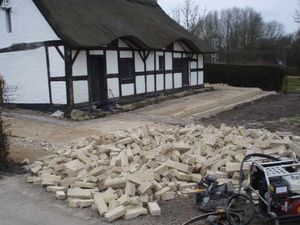 Supporting image for story: Relief as ugly wall demolished at historic Staffordshire cottage
