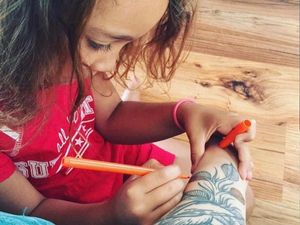 Supporting image for story: This girl coloured in her mum’s tattoo and did an amazing job
