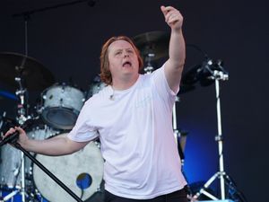 Lewis Capaldi performing on stage