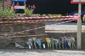 Flowers were placed at the scene of the crash following the tragedy.