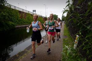 Elite men and women runners set off on the Birmingham Black Country Half Marathon.