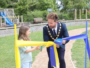 Supporting image for story: Children urged to keep on running after new track is built at primary school